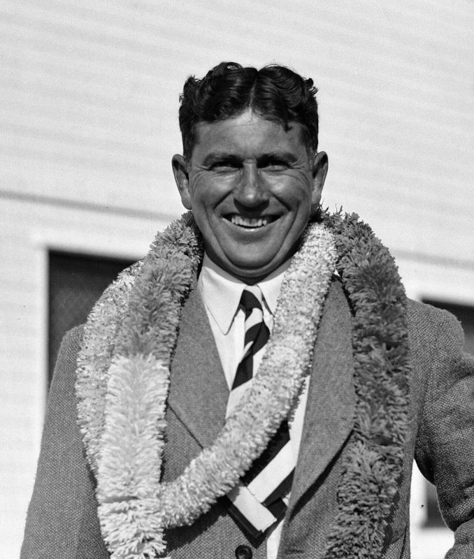Paul C. Bragg wearing leis in 1932